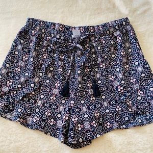 Navy print shorts with tassel draw strings
